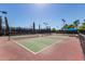 Outdoor pickleball court with lighting and new surfacing at 23116 N Padaro Ct, Sun City West, AZ 85375