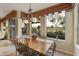 Bright dining area with sliding glass doors, perfect for enjoying breakfast with a view at 23731 S Angora Dr, Sun Lakes, AZ 85248