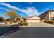 Charming single-story home featuring a three-car garage and desert landscaping at 2422 W Aloe Vera Dr, Phoenix, AZ 85085