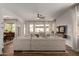 Spacious living room featuring a large sectional sofa and natural light at 2422 W Aloe Vera Dr, Phoenix, AZ 85085