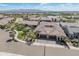 Expansive aerial view of a home in a community featuring tile roofs and desert landscaping at 24670 N 171St Ln, Surprise, AZ 85387