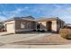 This home features desert landscaping, an attached garage, and neutral colors at 2528 E La Costa Dr, Chandler, AZ 85249