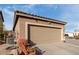 A garage with a door to the house on a sunny day at 2528 E La Costa Dr, Chandler, AZ 85249