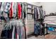 Spacious walk-in closet with shelving and hanging racks for ample storage at 2528 E La Costa Dr, Chandler, AZ 85249