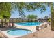 Resort-style community pool area with spa, lounge chairs, and covered seating at 2645 W Florentine Rd, Phoenix, AZ 85086