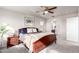 Relaxing main bedroom featuring a bed with nightstands, an ensuite bathroom, and ample natural light at 2645 W Florentine Rd, Phoenix, AZ 85086