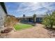 Inviting backyard featuring artificial turf and low maintenance desert landscaping, perfect for outdoor living at 2902 E Escondido Ave, Mesa, AZ 85204