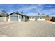 Charming single-story home with desert landscaping, covered parking, and a two-car garage at 2902 E Escondido Ave, Mesa, AZ 85204