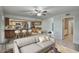 Cozy living space featuring a kitchen bar with barstool seating and a comfortable sitting area at 2902 E Escondido Ave, Mesa, AZ 85204