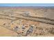 Expansive aerial view of a desert property featuring horse property and neighboring school at 29409 N 220Th Ave, Wittmann, AZ 85361