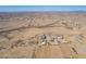 Desert property aerial featuring horse facilities and expansive sand at 29409 N 220Th Ave, Wittmann, AZ 85361