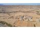 Desert horse property aerial featuring pens, facilities, and desert terrain at 29409 N 220Th Ave, Wittmann, AZ 85361