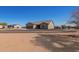 Charming single-story home with desert landscaping, providing a peaceful rural lifestyle at 29409 N 220Th Ave, Wittmann, AZ 85361