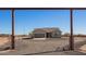 Single-story home featuring a neutral color scheme, two-car garage, and a graveled front yard at 29409 N 220Th Ave, Wittmann, AZ 85361