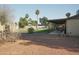 Backyard features a swimming pool, patio, and a well maintained lawn area at 3119 S Stewart Cir, Mesa, AZ 85202