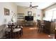 Cozy living room area with a vaulted ceiling, bar, and warm lighting at 3119 S Stewart Cir, Mesa, AZ 85202