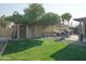 Outbuilding in a spacious backyard with a truck parked at 3119 S Stewart Cir, Mesa, AZ 85202