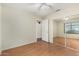 Spacious bedroom with closet and laminate flooring at 3365 W Abraham Ln, Phoenix, AZ 85027