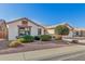 Lovely single-story home featuring a landscaped front yard with desert rock and shrubs at 3365 W Abraham Ln, Phoenix, AZ 85027