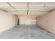 Spacious garage with ample storage cabinets and epoxy flooring at 3365 W Abraham Ln, Phoenix, AZ 85027