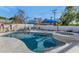 Sparkling backyard pool and spa area, with shaded lounge seating and privacy walls at 3511 E Orange Dr, Phoenix, AZ 85018