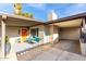 Comfortable outdoor patio area with modern chairs, decor and charming front entrance at 3637 E Yale St, Phoenix, AZ 85008