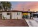 Charming single-story home with covered patio and spacious driveway at sunset at 3637 E Yale St, Phoenix, AZ 85008