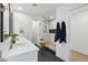 Modern bathroom featuring a glass walk-in shower, dual sink vanity, and sleek finishes at 3803 S Elm St, Tempe, AZ 85282