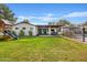 Spacious backyard featuring a patio, pool, and lush lawn perfect for outdoor living and entertaining at 3922 E Elm St, Phoenix, AZ 85018