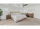 Light-filled primary bedroom with neutral tones, carpeted floors, a ceiling fan, and a warm and inviting atmosphere at 3922 E Elm St, Phoenix, AZ 85018