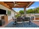 Inviting outdoor dining area with a ceiling fan, and a built-in grill for entertaining guests at 3922 E Elm St, Phoenix, AZ 85018