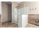 Modern bathroom featuring a glass-enclosed shower and stylish vanity with elegant fixtures at 4033 S Harlan --, Mesa, AZ 85212