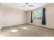 Bedroom with soft carpet, neutral walls, and a ceiling fan, creating a serene atmosphere at 4033 S Harlan --, Mesa, AZ 85212