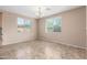 Bright dining room featuring tile floors, neutral walls, and a contemporary chandelier fixture at 4033 S Harlan --, Mesa, AZ 85212