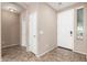 Inviting foyer with neutral-colored walls and tile flooring, leading to other areas of the home at 4033 S Harlan --, Mesa, AZ 85212