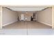 Well-lit, spacious garage features utility sink, water heater, and ample storage space at 4033 S Harlan --, Mesa, AZ 85212