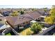 Aerial view of the fenced backyard showcasing a well-maintained lawn and patio with pergola at 4040 E Rowel Rd, Phoenix, AZ 85050