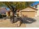 Charming single-story home with a well-manicured yard and a two-car garage at 4040 E Rowel Rd, Phoenix, AZ 85050