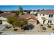 Aerial view of a single-Gathering home with desert landscaping, and a tile roof at 4040 E Rowel Rd, Phoenix, AZ 85050