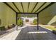 Covered patio with tiled floor, rock landscaping, and an unobstructed view of backyard at 4040 E Rowel Rd, Phoenix, AZ 85050