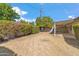 Large backyard with lawn and mature trees providing a private space at 4622 N 78Th St, Scottsdale, AZ 85251