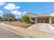 Charming single-story home featuring desert landscaping, an attached carport, and a welcoming front entrance at 4622 N 78Th St, Scottsdale, AZ 85251