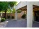 Covered patio area with a brick floor and landscaping at 4757 E Amber Sun Dr, Cave Creek, AZ 85331