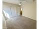 Bedroom featuring neutral walls, carpet, closet and adjacent room at 4757 E Amber Sun Dr, Cave Creek, AZ 85331