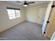 Bright bedroom with neutral carpet, ceiling fan and natural light at 4757 E Amber Sun Dr, Cave Creek, AZ 85331