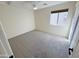 Bright bedroom featuring neutral walls, carpet, and a ceiling fan at 4757 E Amber Sun Dr, Cave Creek, AZ 85331