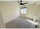 Bedroom featuring neutral walls, carpet, ceiling fan and closet at 4757 E Amber Sun Dr, Cave Creek, AZ 85331