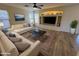 Cozy living room with recessed lighting, a ceiling fan, a built-in entertainment center and comfortable seating at 4757 E Amber Sun Dr, Cave Creek, AZ 85331