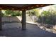 Covered patio features brick pavers, block wall and string lights at 4757 E Amber Sun Dr, Cave Creek, AZ 85331