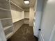 Spacious walk-in closet with multiple shelves and rods for optimal storage at 4757 E Amber Sun Dr, Cave Creek, AZ 85331